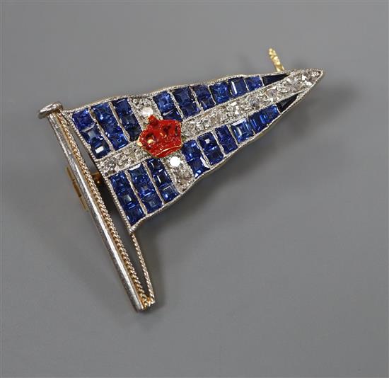 A 20th century yellow metal, sapphire, diamond and enamel set pennant brooch, 27mm, gross 4.4 grams.